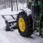 big-special-tractor-is-removing-snow-from-forestal-road