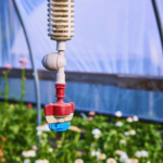 greenhouse-sprinkler-system-with-lush-plants-eye-level